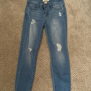 Mid rise distressed jeans